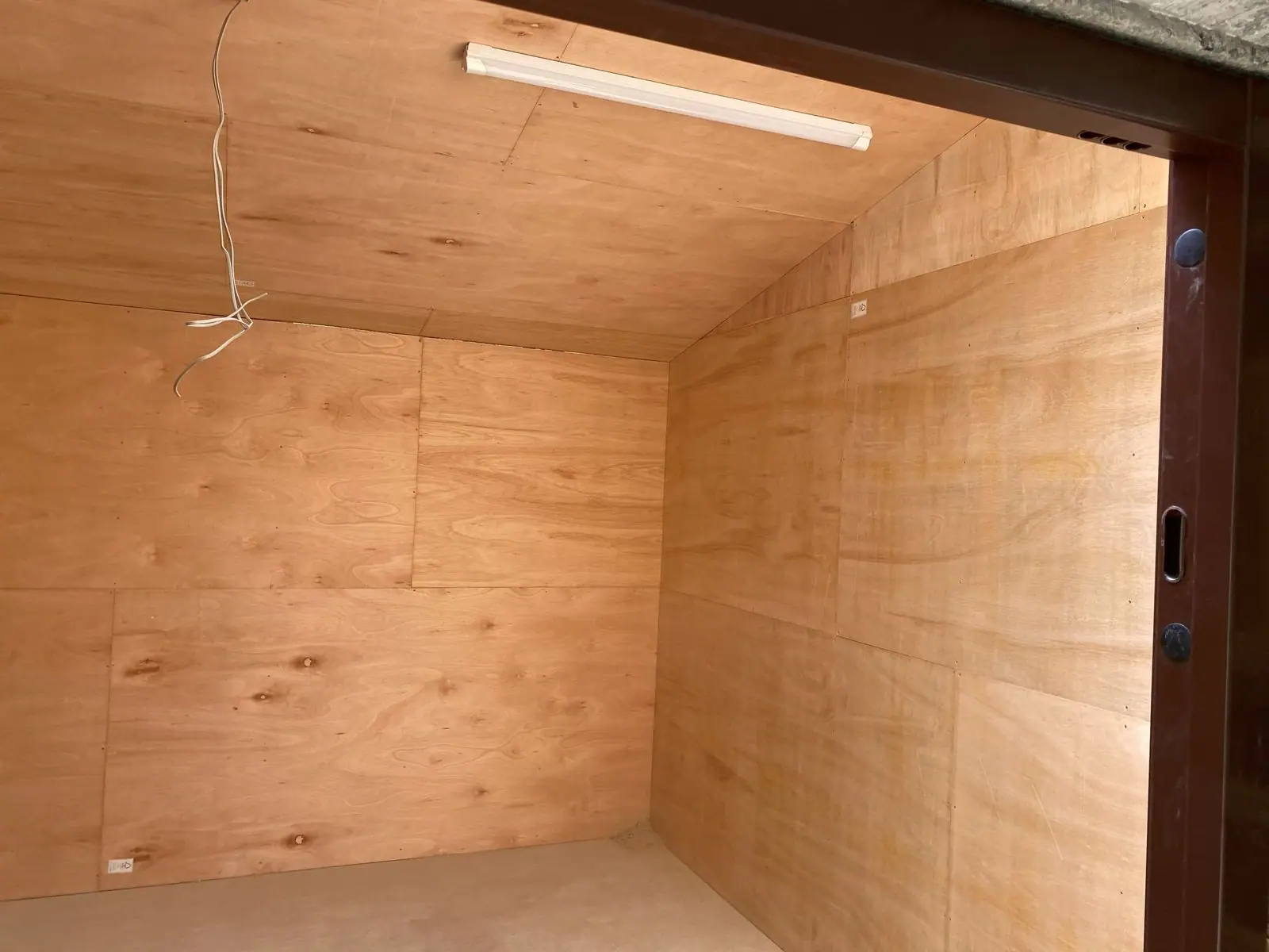 Inside a finished stable lined in timber