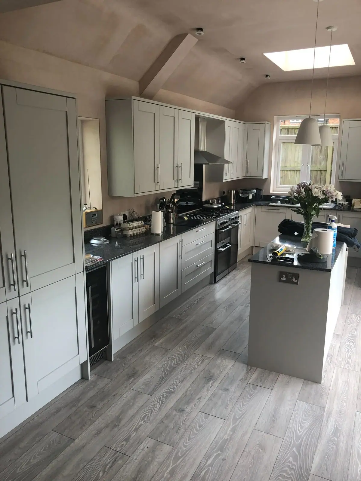Tall larder units and wall cupboards