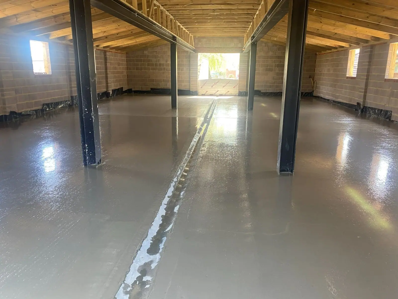 Power-floated concrete floor inside the building