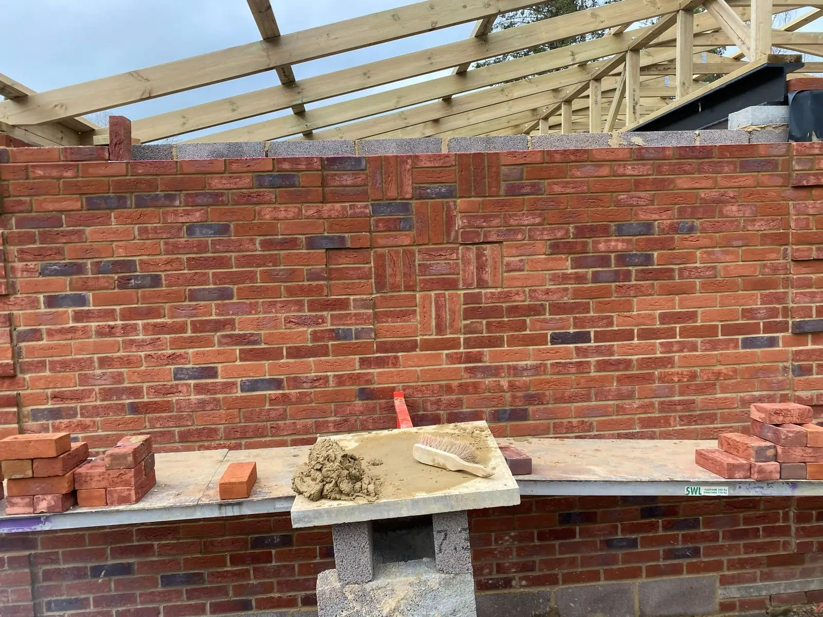 Brick gable with a decorative feature panel
