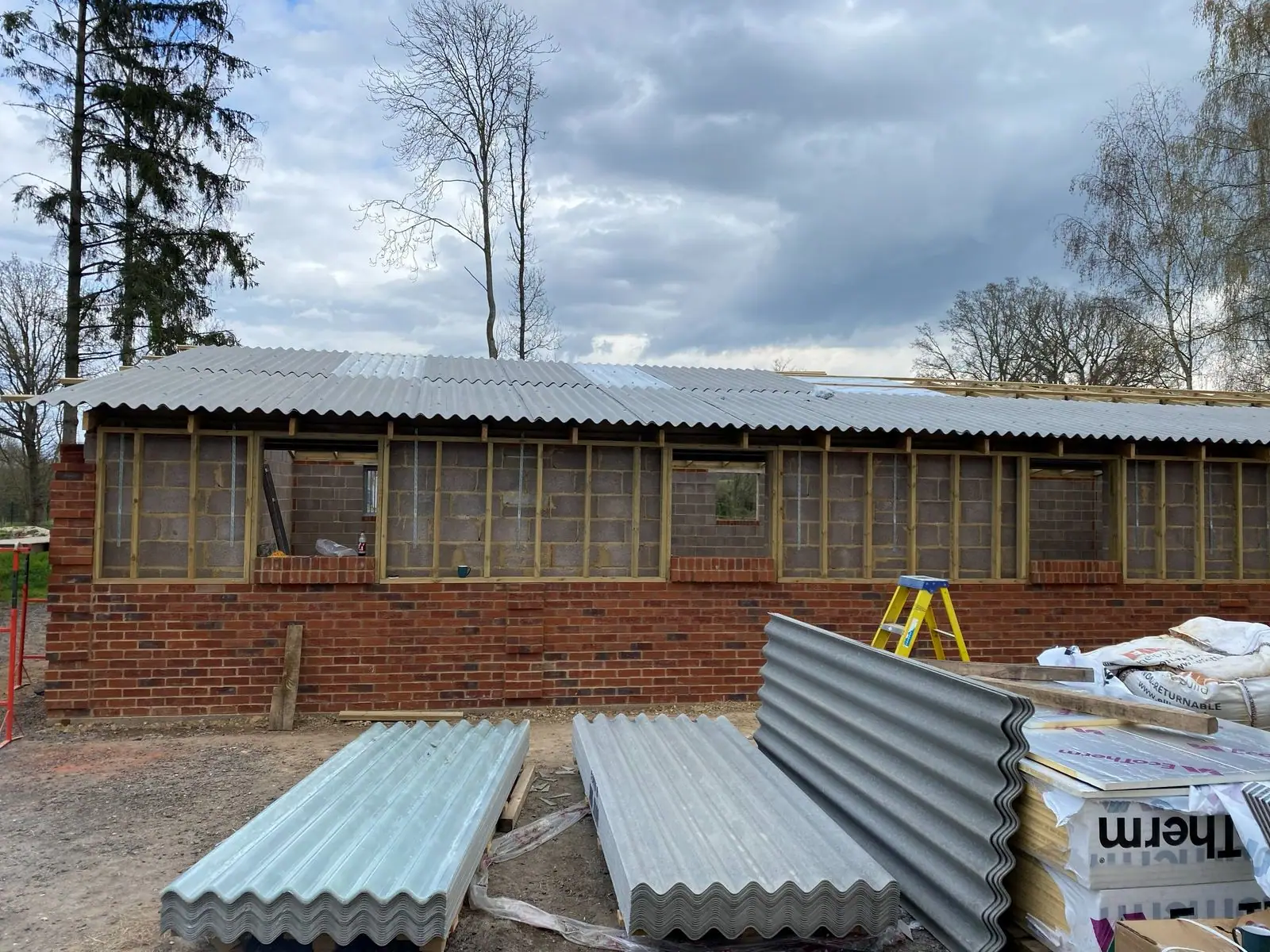 Corrugated roof sheets fixed on the trusses